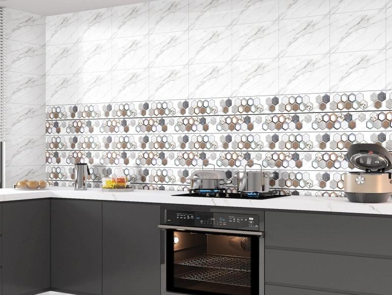 Stylish open kitchen design with dark cabinets, marble walls, hexagonal backsplash, and modern appliances.
